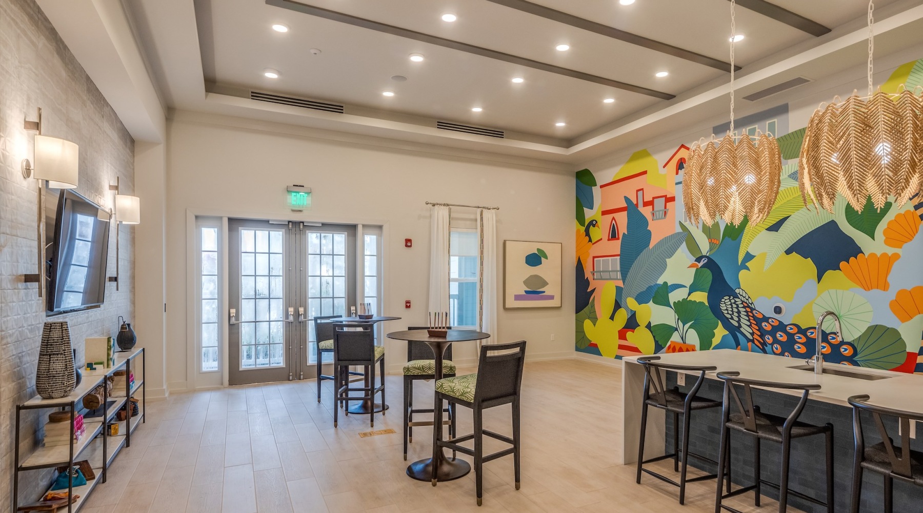 a colorful lounge and media area